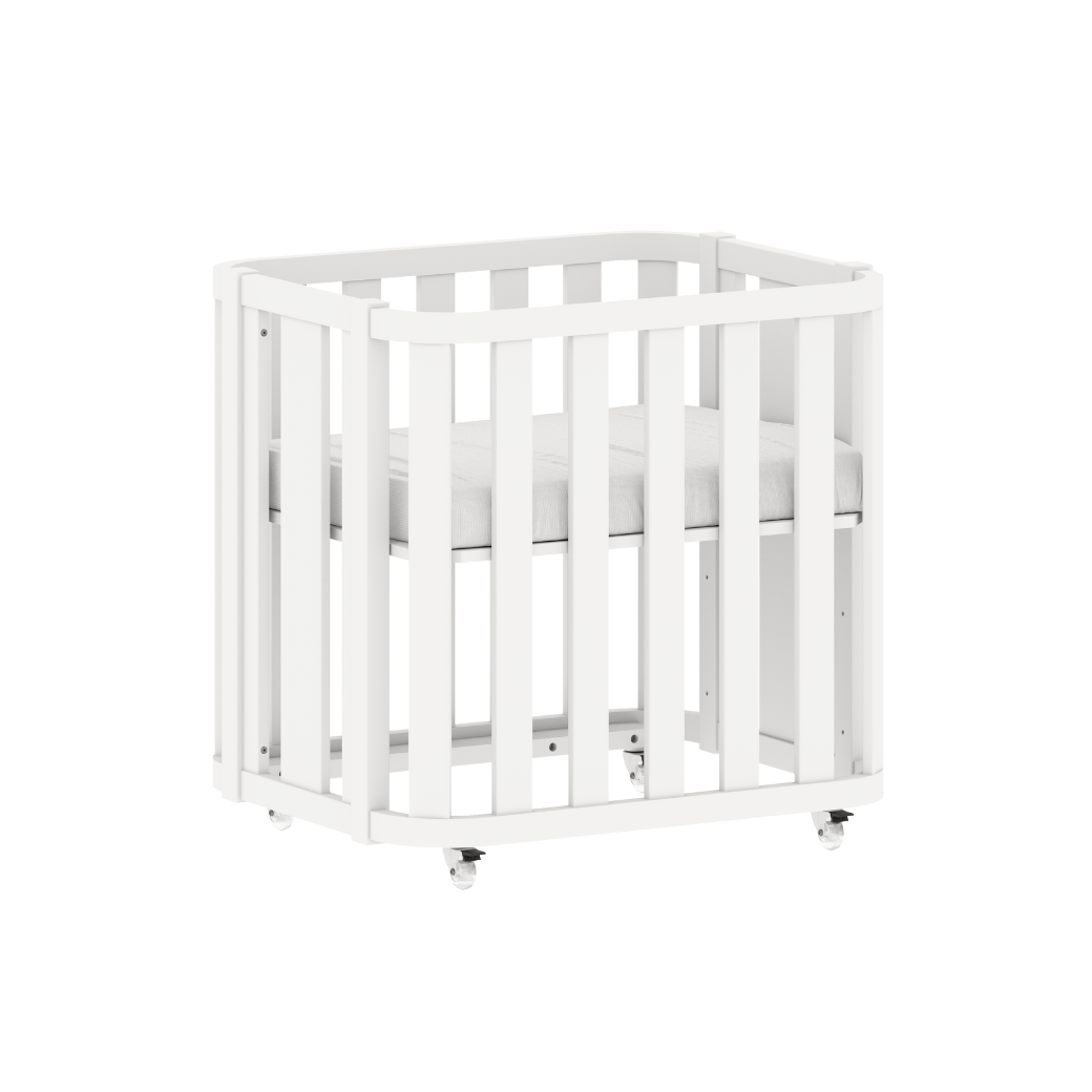 Mini berço Loop  na cor branca de forma lateral